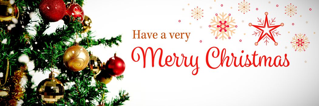 Christmas card against red and gold christmas balls hanging in tree