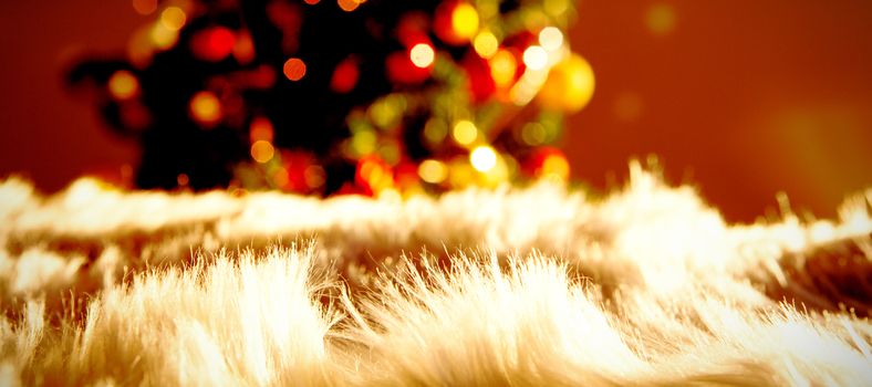 White carpet against unfocused Christmas decoration
