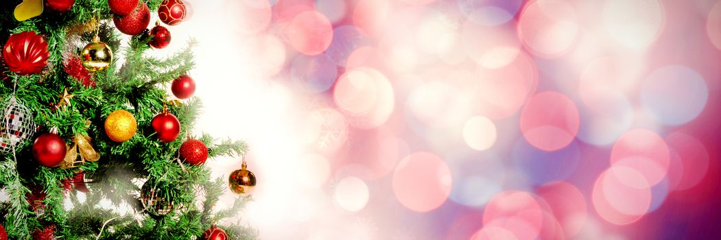 Glowing christmas background against christmas pine tree with gifts
