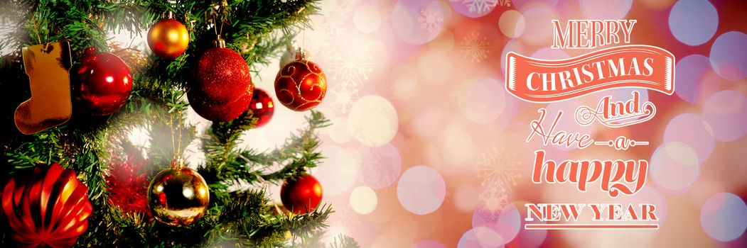 Merry Christmas message against glowing christmas background