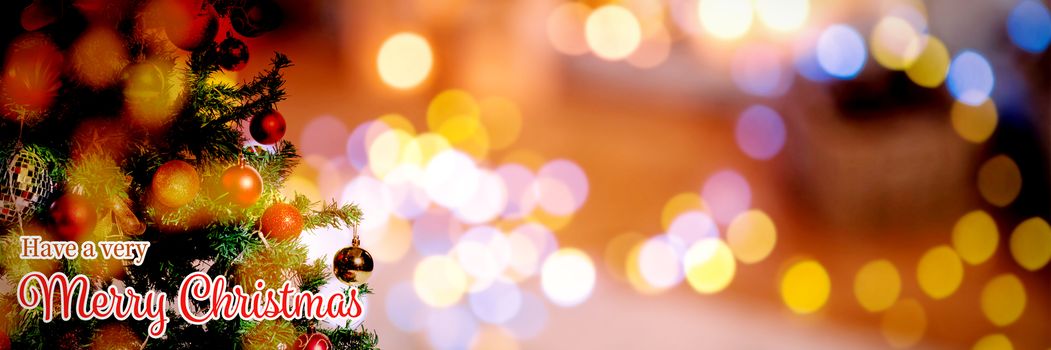 Christmas card against christmas yellow circle lights