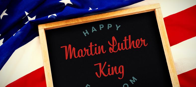 happy Martin Luther King freedom against blank slate on national flag