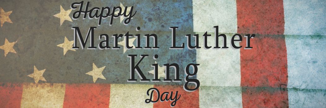 happy Martin Luther King day against folded american flag