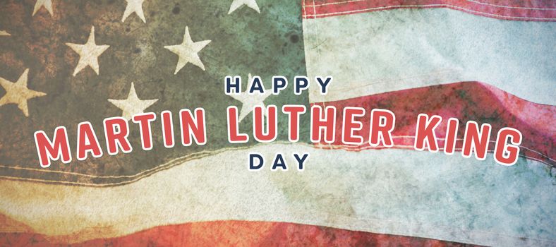 happy Martin Luther King day against full frame of wrinkled american flag
