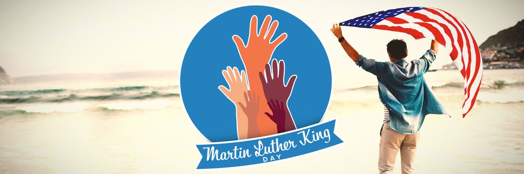 Martin Luther king day with hands against man carrying american flag on shore