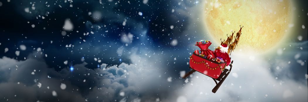 Snow falling against stars twinkling in night sky