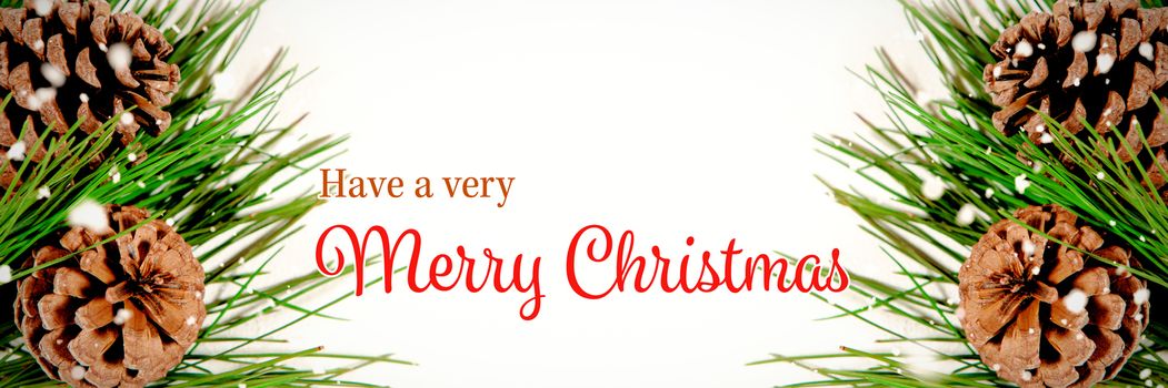 Christmas card against pine cones with copy space