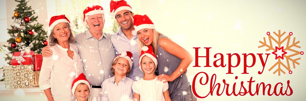 Family posing for photo against christmas card