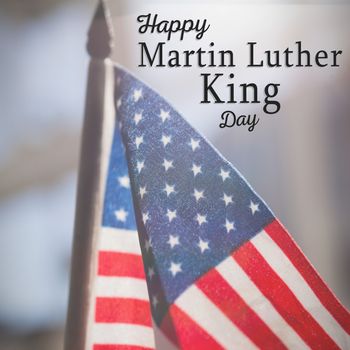 happy Martin Luther King day against american flag waving in restaurant