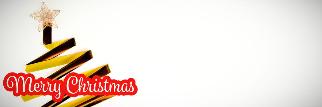 White and red greeting card against golden ribbon in a christmas tree shape