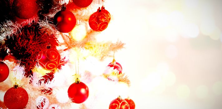 Composite image of table against red and white christmas decorations