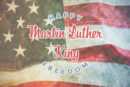 happy Martin Luther King freedom against full frame of wrinkled american flag