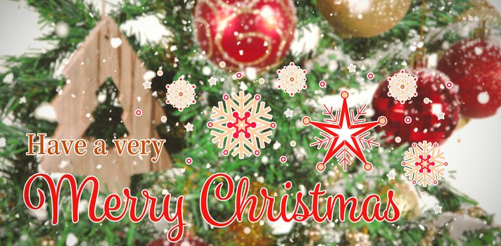 Christmas card against close-up of christmas decorations in tree