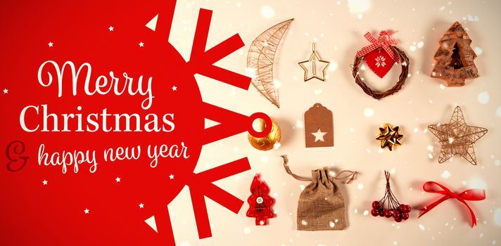 White and red greetings card against copy space and christmas ornaments