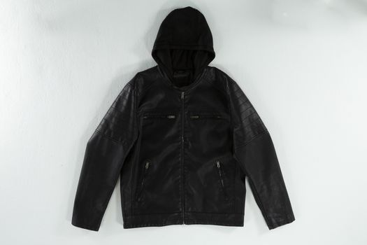 Close-up of hoodie jacket on white background