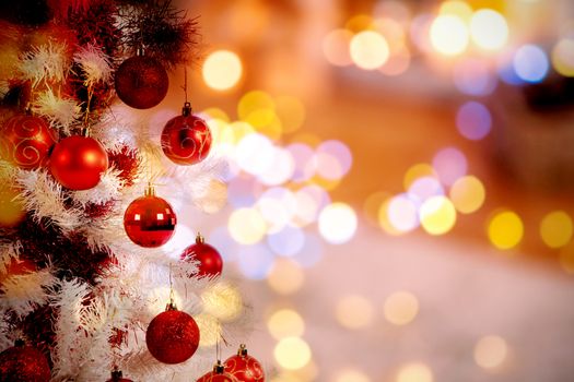 Christmas yellow circle lights against christmas tree with copy space