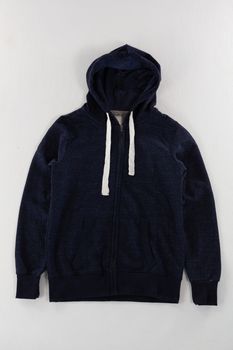 Close-up of hoodie jacket on white background