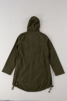 Close-up of hoodie jacket on white background