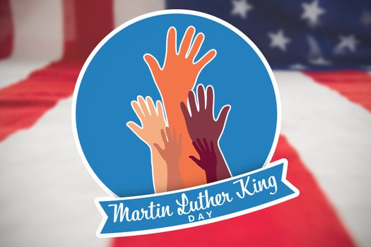 Martin Luther king day with hands against close-up of american flag