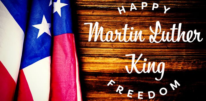 happy Martin Luther King freedom against usa flag on table