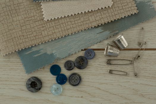 Overhead of textile and various equipments on a table