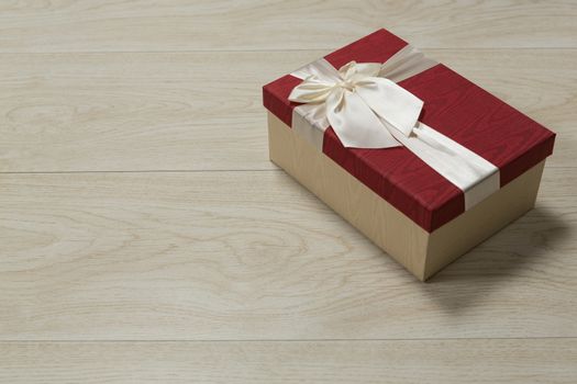 Close-up of gift box on a wooden table