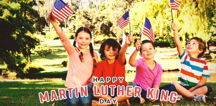 Children holding American flag against happy martin luther king day