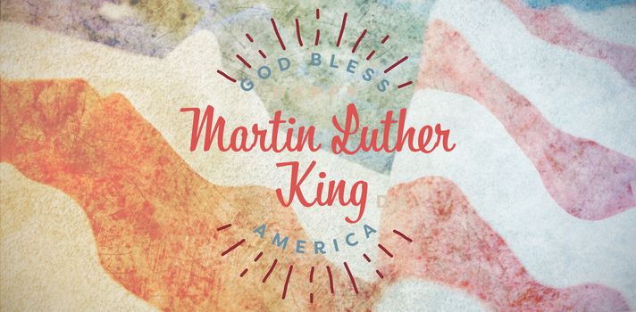 happy Martin Luther King day, god bless america against close-up of wrinkled american flag