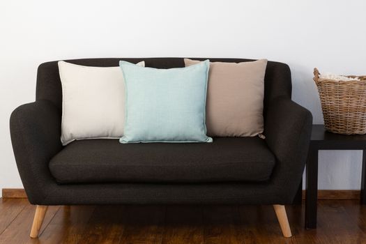Various cushions arranged on sofa