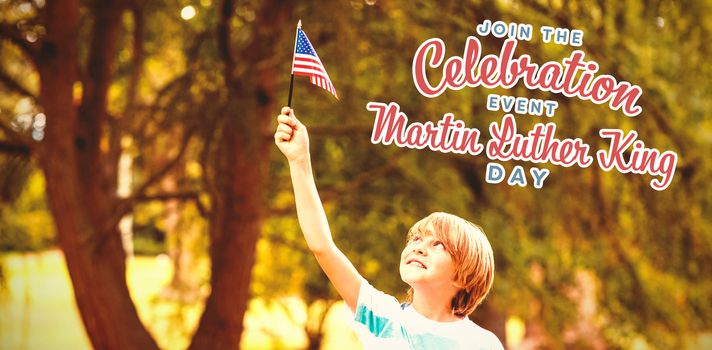 Boy with American flag against join the celebration event martin luther king day