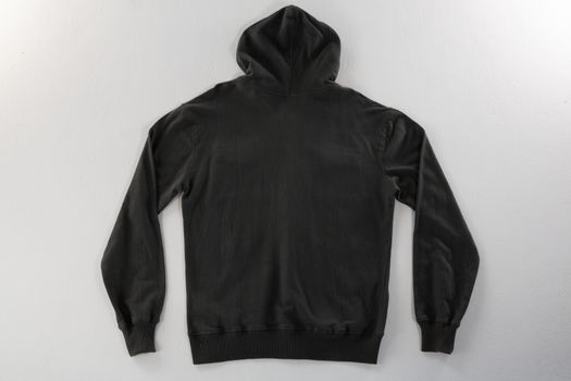 Close-up of hoodie jacket on white background