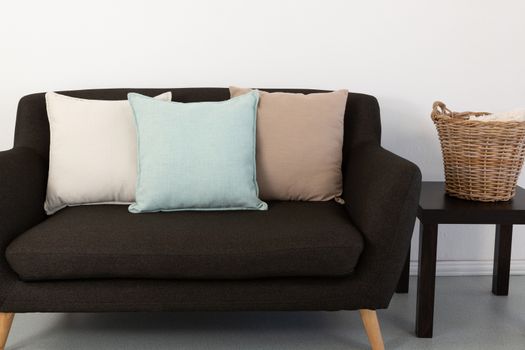Various cushions arranged on sofa