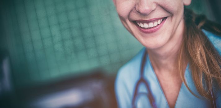 Portrait of nurse smiling at camera in the hospital
