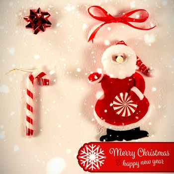 Banner Merry Christmas against santa claus and other christmas decorations