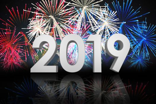 Digital image of three dimensional new year numbers against fireworks exploding over football stadium
