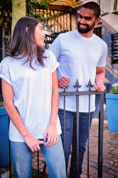 Hipster couple with copy space blank t-shirts for your design