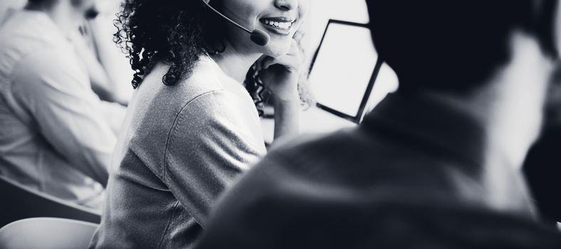 Portrait of customer service executive working at office