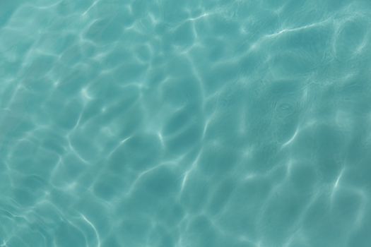 Water rippled and surface in a swimming pool on a sunny day