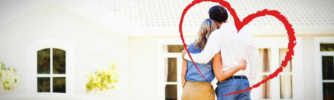 Heart against rear view of couple standing with arm around