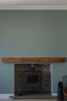 Front view of a modern fireplace in a living room at home