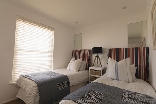 Modern luxury bedroom with blankets and pillows