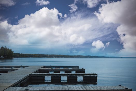 Sky and cloud on a sunny day against river pier at dawn