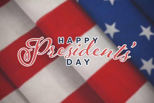 Happy presidents day. Vector typography against close-up of folded american flag