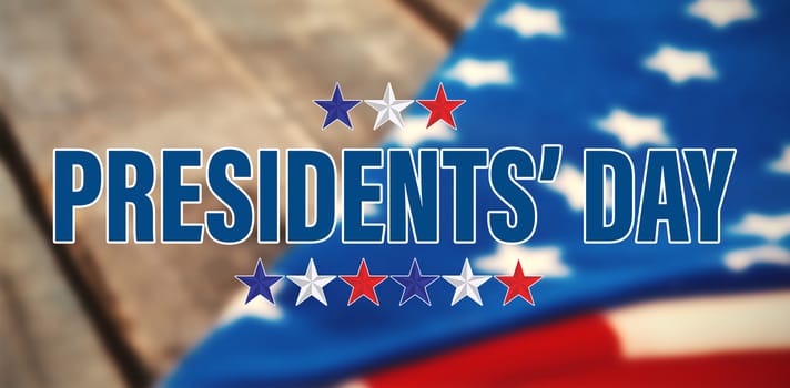 presidents day. Vector typography, stars against folded american flag on wooden table