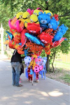 colourful balloon seller