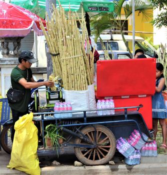 Sugar cane juice seller in asia