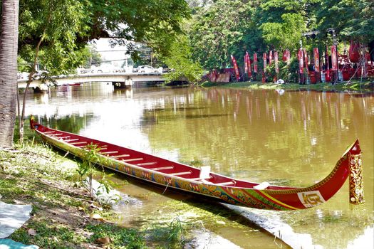the river in siem reap with a racing boat for the water festival