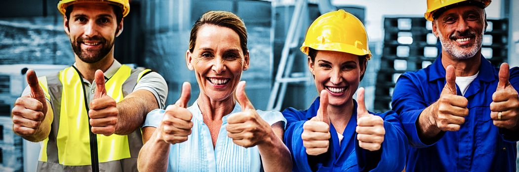 Workers at warehouse with thumbs up