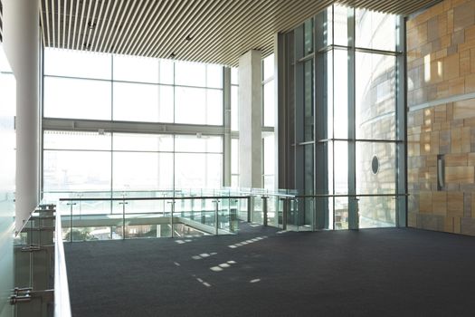 Empty commercial modern business office balcony with high ceiling 