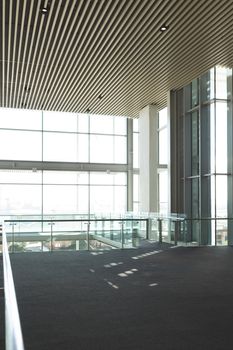 Empty commercial modern business office balcony with big windows showing view